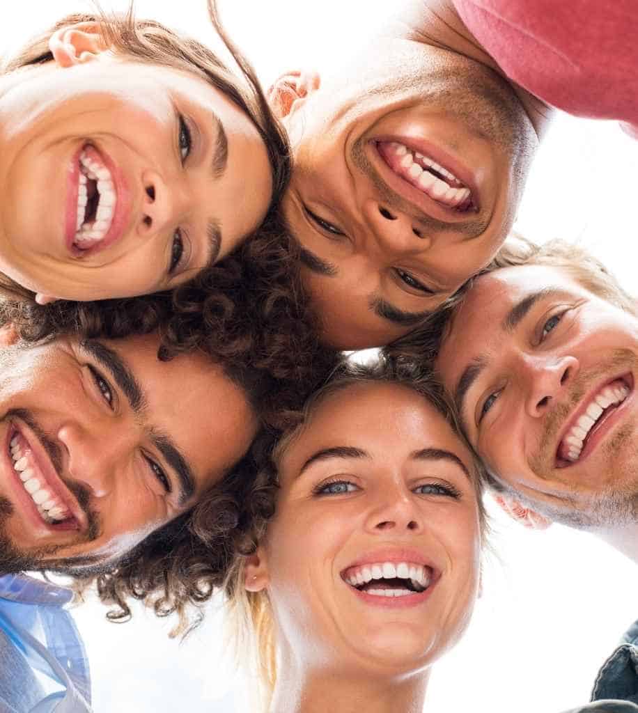 Smiling person showcasing white teeth after laser whitening treatment Northampton